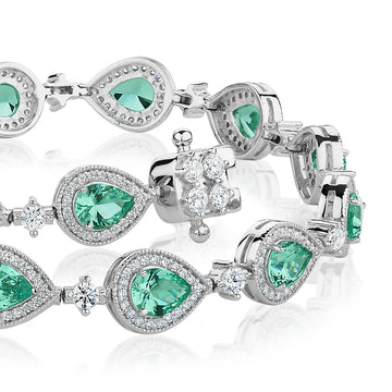 Pear and Round Brilliant tennis bracelet with ocean green simulants and 1.50 carats* of diamond simulants in sterling silver secondary view