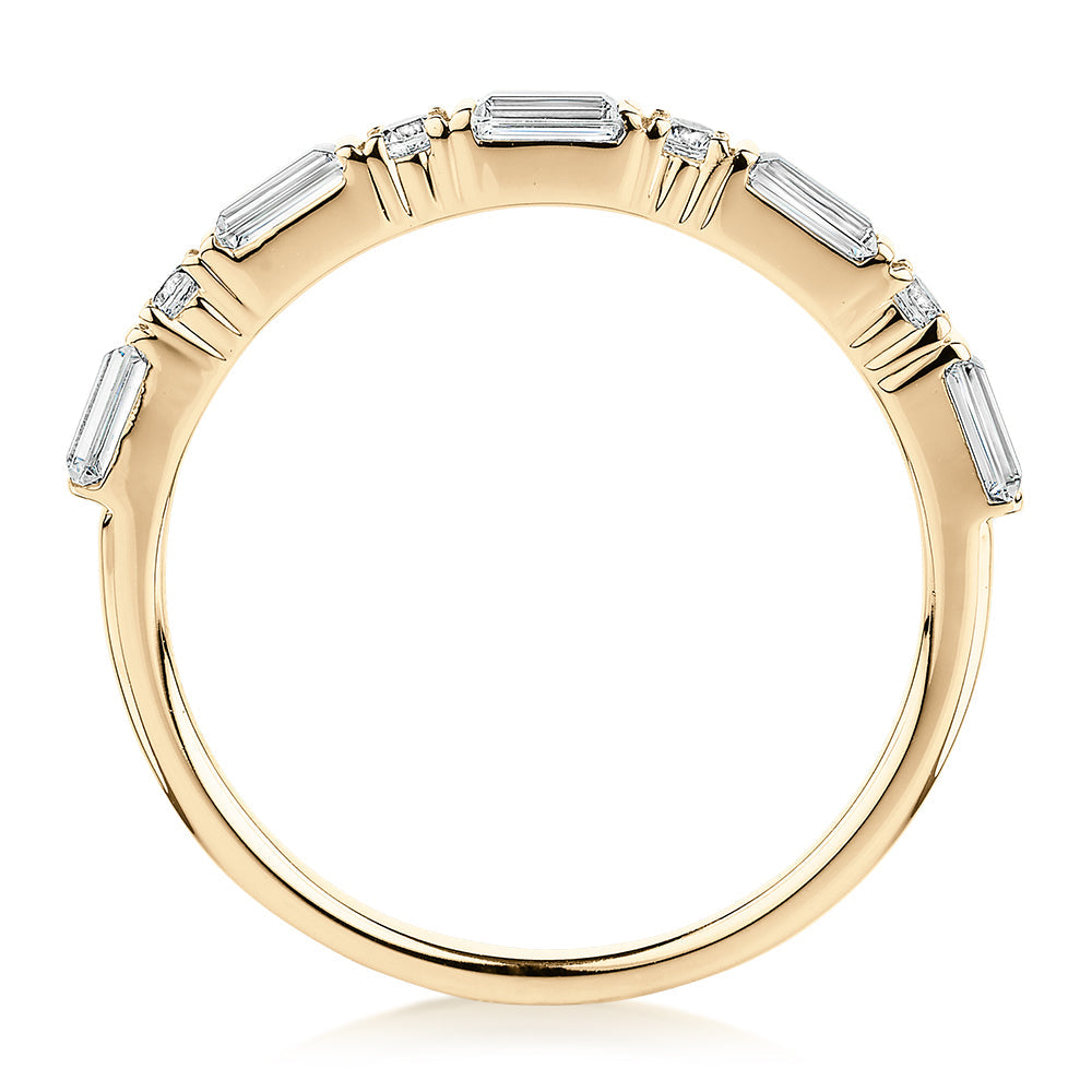 Baguette wedding or eternity band with 0.75 carats* of diamond simulants in 10 carat yellow gold