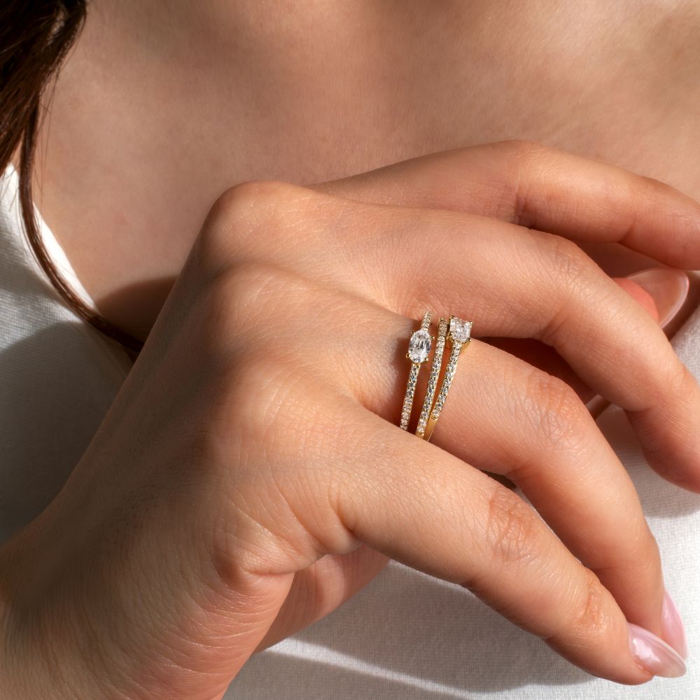 Dress ring with 0.31 carats* of diamond simulants in 10 carat yellow gold