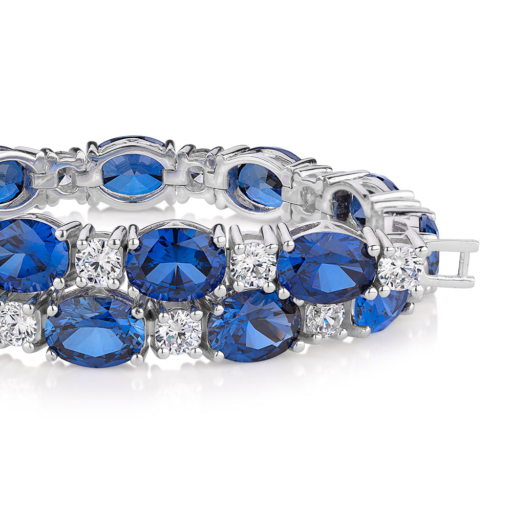Oval and Round Brilliant tennis bracelet with sapphire simulants and 3.36 carats* of diamond simulants in sterling silver