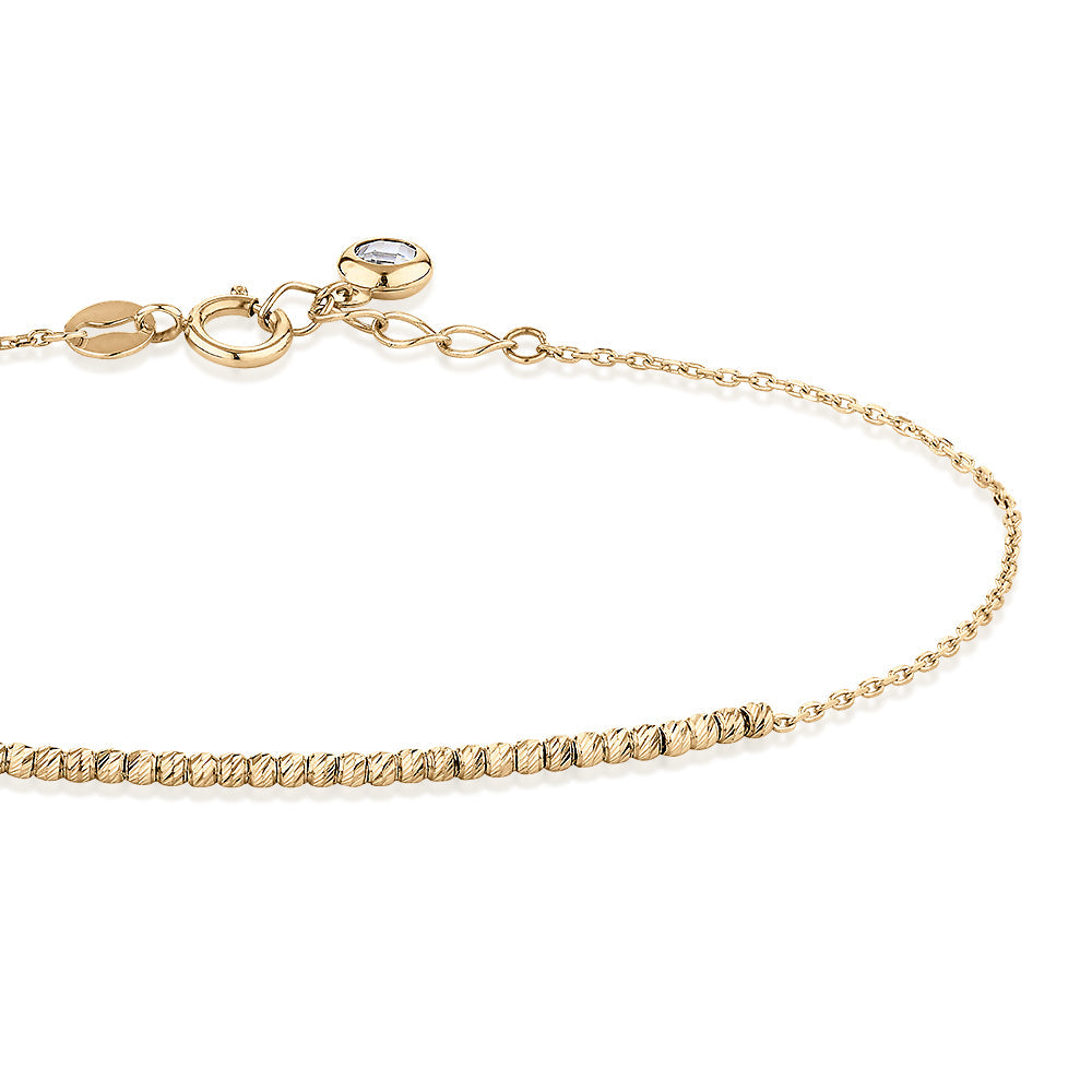 Bracelet with diamond simulant in 10 carat yellow gold
