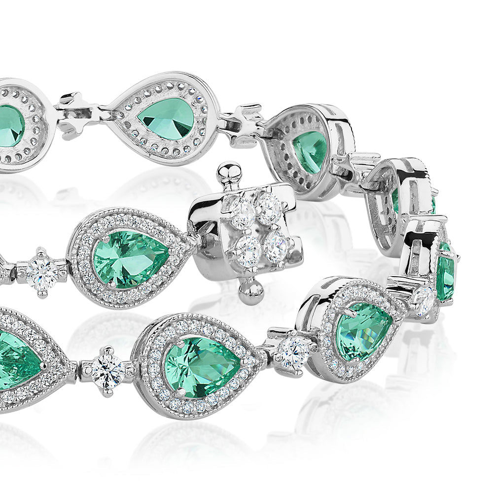 Pear and Round Brilliant tennis bracelet with ocean green simulants and 1.50 carats* of diamond simulants in sterling silver