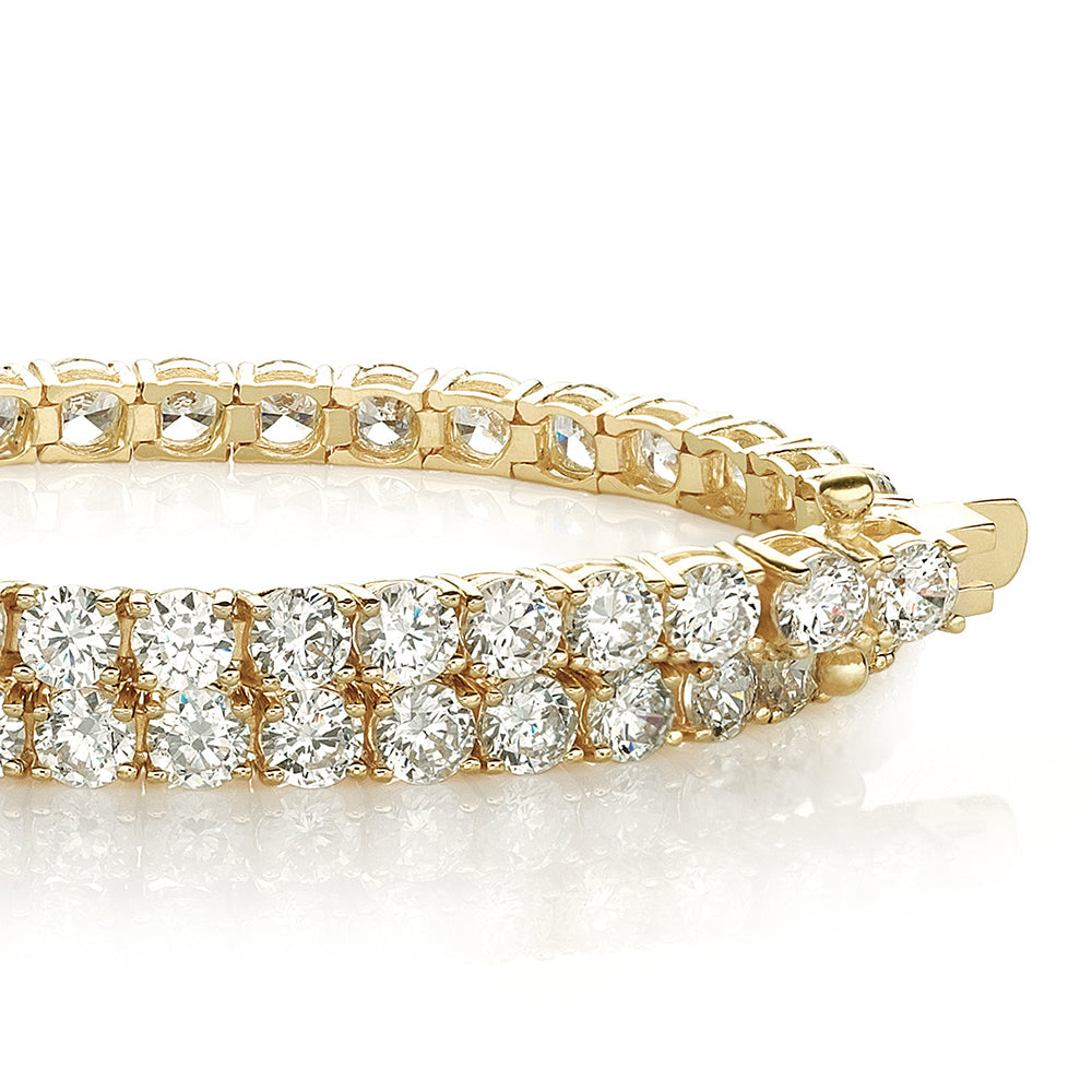Round Brilliant tennis bracelet with 6.27 carats* of diamond simulants in 10 carat yellow gold