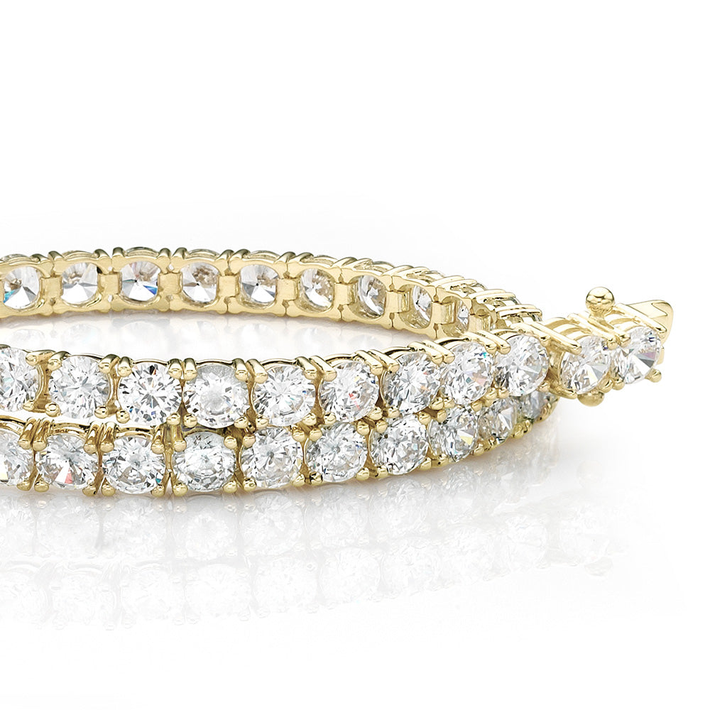 Round Brilliant tennis bracelet with 8.5 carats* of diamond simulants in 10 carat yellow gold
