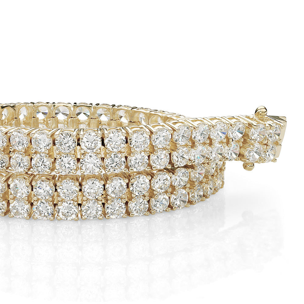 Round Brilliant tennis bracelet with 12.54 carats* of diamond simulants in 10 carat yellow gold