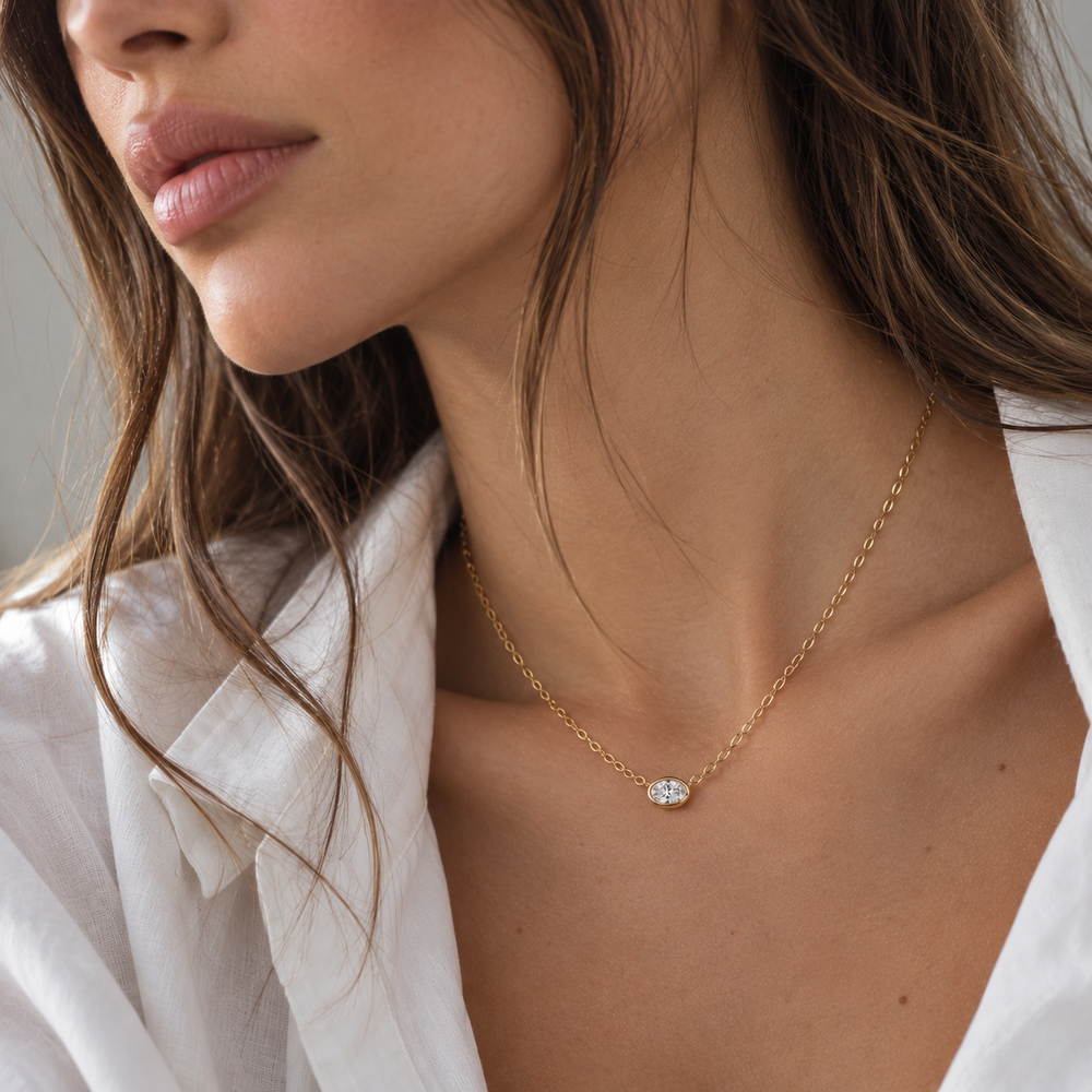 Lab-Grown Diamond, 0.09 carat oval solitaire necklace in 10 carat yellow gold