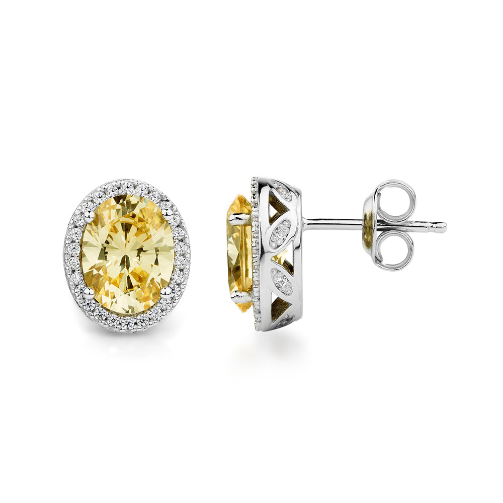 Oval and Round Brilliant halo stud earrings with 4.06 carats* of diamond simulants in sterling silver