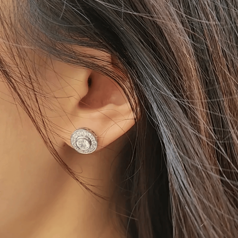 Round Brilliant halo stud earrings with 1.9 carats* of diamond simulants in sterling silver