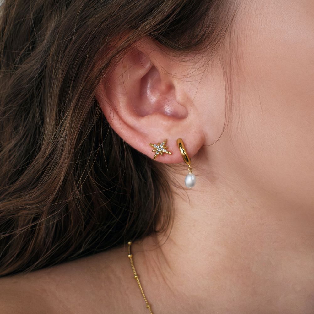 Fancy earrings with round brilliant diamond simulants in 18 carat yellow gold vermeil