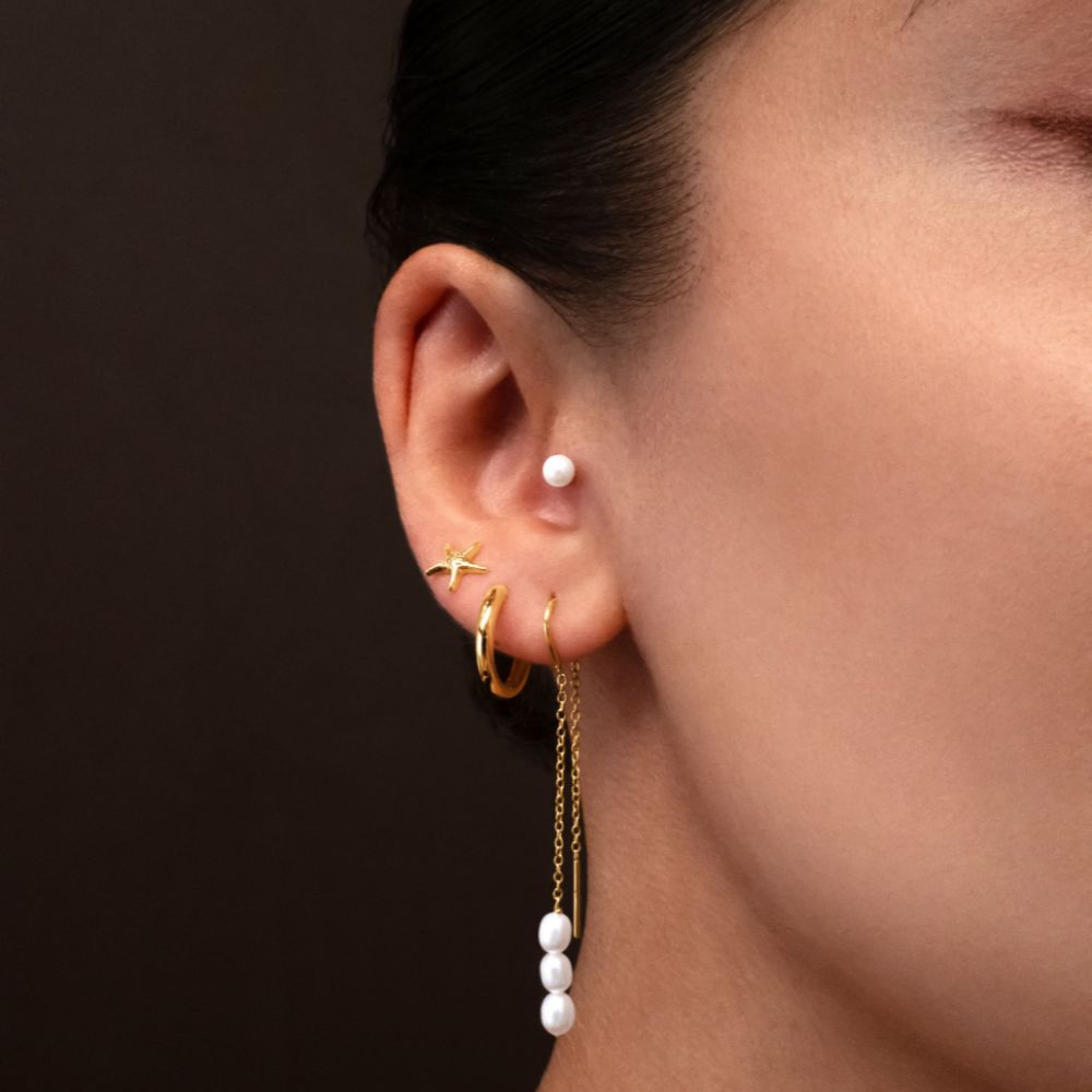 Pearl stud earrings in 18 carat yellow gold vermeil