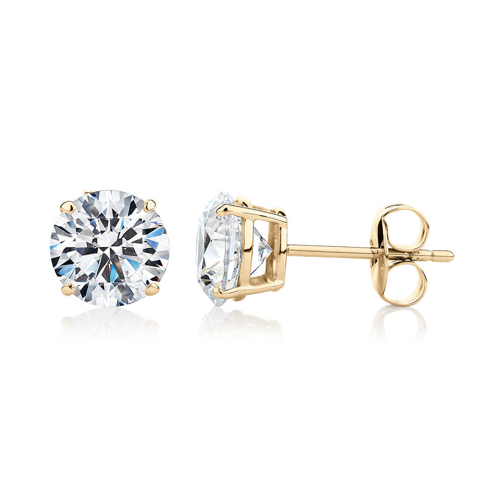 Round Brilliant stud earrings with 3 carats* of diamond simulants in 10 carat yellow gold
