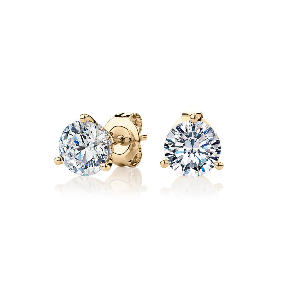 Round Brilliant stud earrings with 2.18 carats* of diamond simulants in 10 carat yellow gold