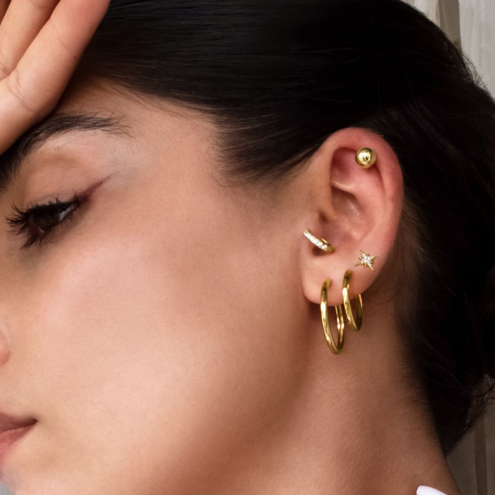 Round brilliannt hoop earrings with diamond simulants in 18 carat yellow gold vermeil