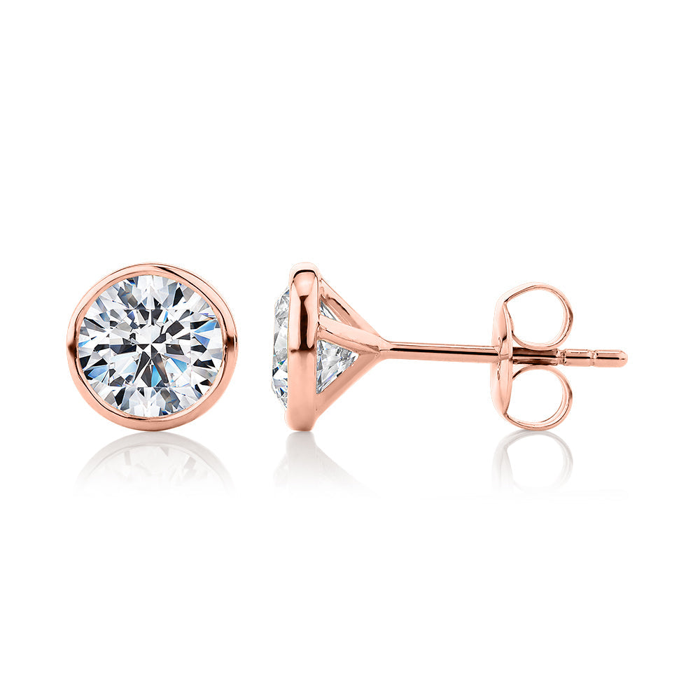 Round Brilliant stud earrings with 2 carats* of diamond simulants in 10 carat rose gold