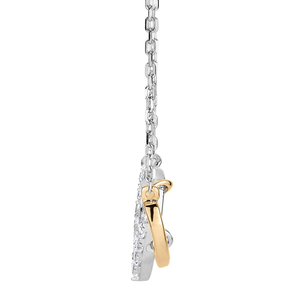 Necklace with 0.22 carats* of diamond simulants in 10 carat yellow gold and sterling silver