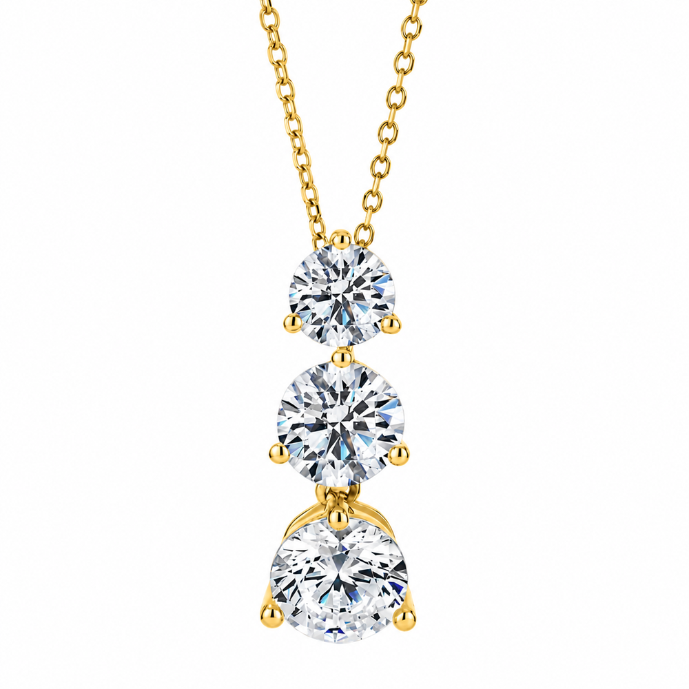 Three stone drop pendant with 2.33 carats* of diamond simulants in 10 carat yellow gold