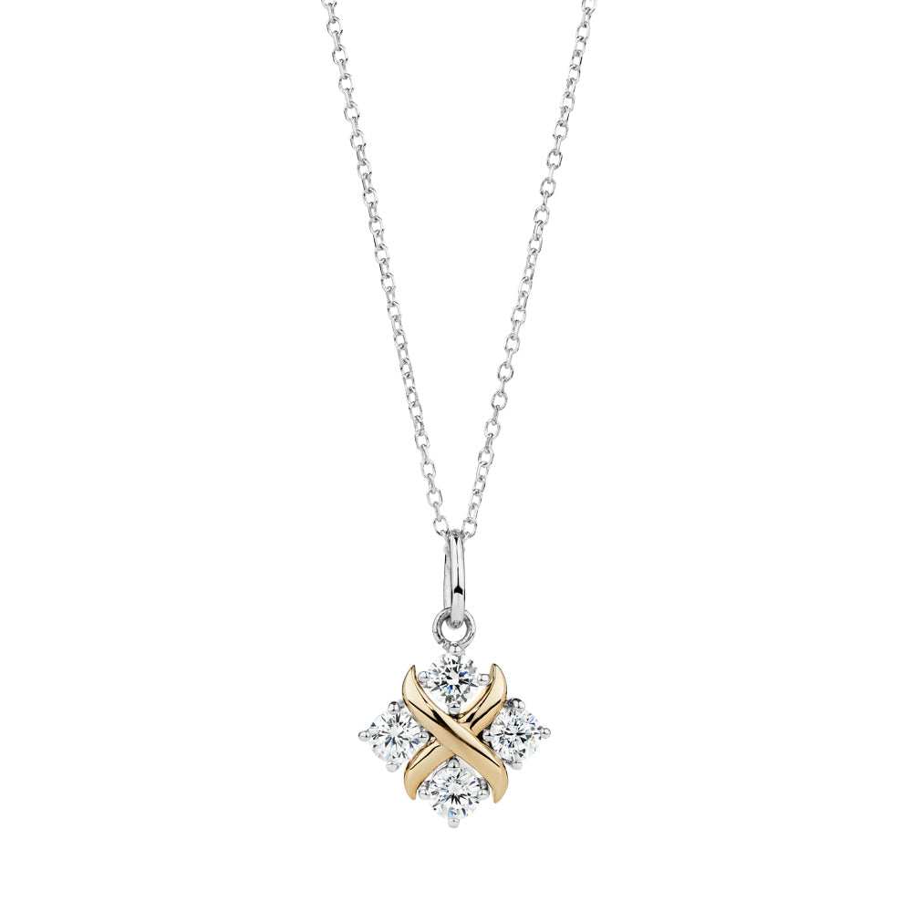 Fancy pendant with 0.44 carats* of diamond simulants in 10 carat yellow gold and sterling silver