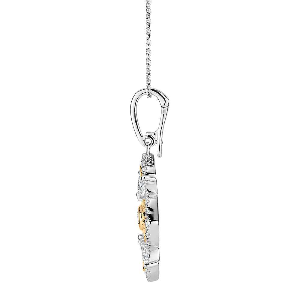 Fancy pendant with 0.97 carats* of diamond simulants in 10 carat yellow gold and sterling silver