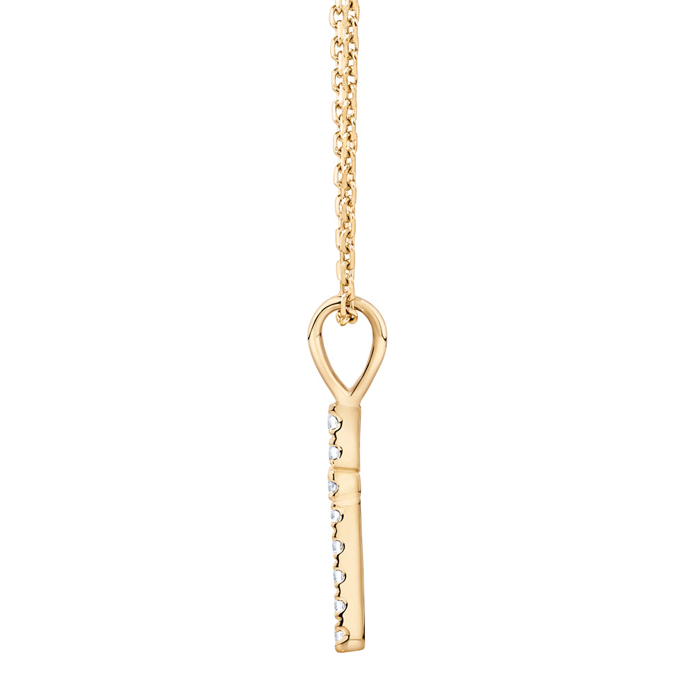 Cross pendant in 10 carat yellow gold