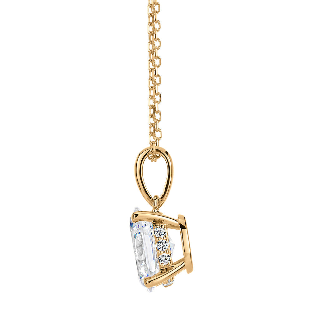 Oval and Round Brilliant solitaire pendant with 1.25 carats* of diamond simulants in 10 carat yellow gold