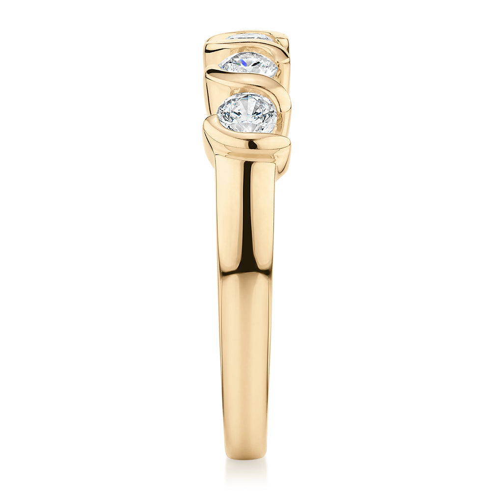 Wedding or eternity band with 0.55 carats* of diamond simulants in 10 carat yellow gold