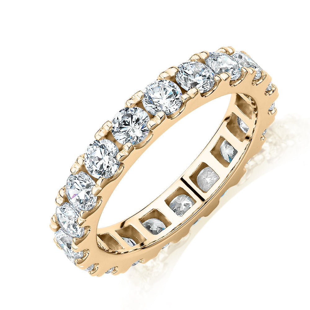 All-rounder eternity band with 2.09 carats* of diamond simulants in 14 carat yellow gold
