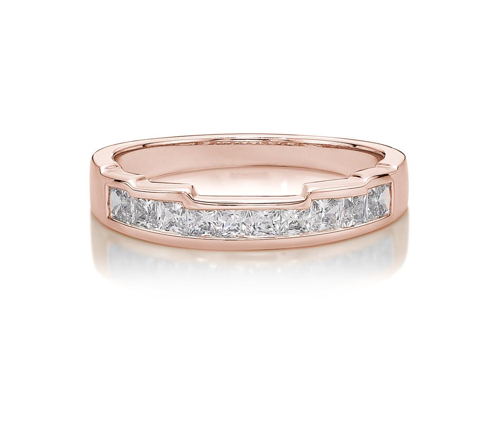 Wedding or eternity band with 0.64 carats* of diamond simulants in 10 carat rose gold