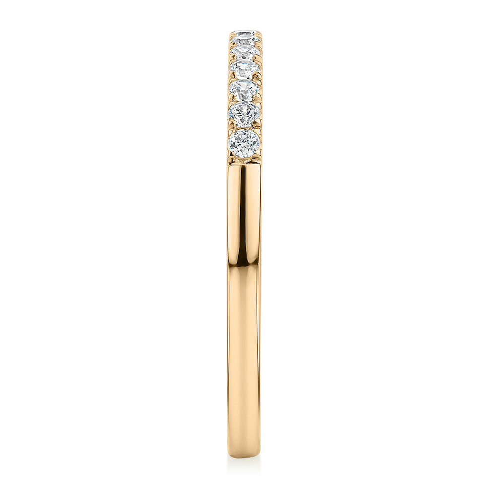 Wedding or eternity band in 14 carat yellow gold