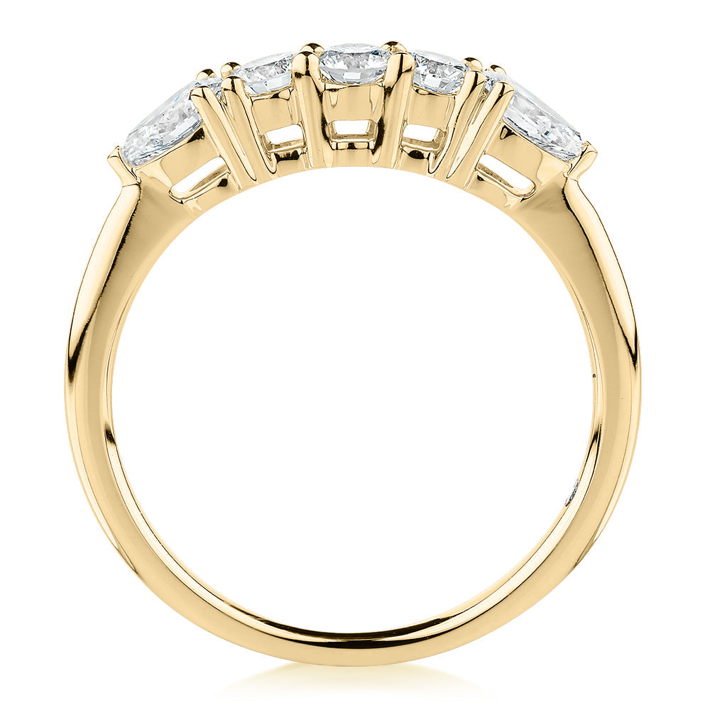 Curved wedding or eternity band with 0.83 carats* of diamond simulants in 14 carat yellow gold