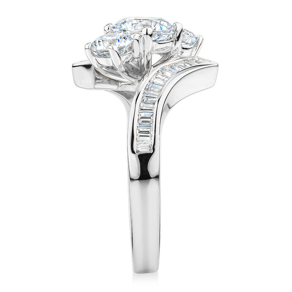 Three stone ring with 2.63 carats* of diamond simulants in 10 carat white gold