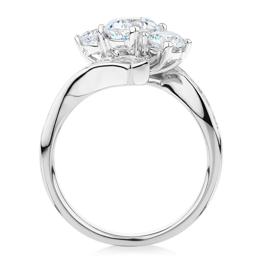 Three stone ring with 2.63 carats* of diamond simulants in 10 carat white gold
