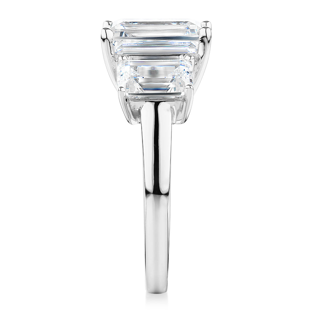 Three stone ring with 4.9 carats* of diamond simulants in 10 carat white gold