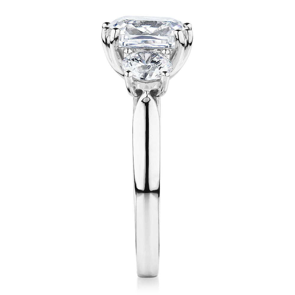 Three stone ring with 3.75 carats* of diamond simulants in 10 carat white gold