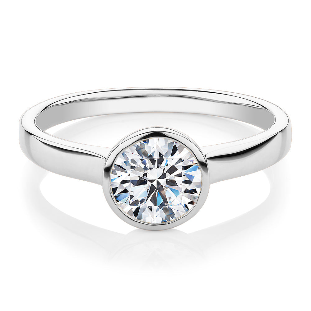 Round Brilliant solitaire engagement ring with 1 carat* diamond simulant in 14 carat white gold