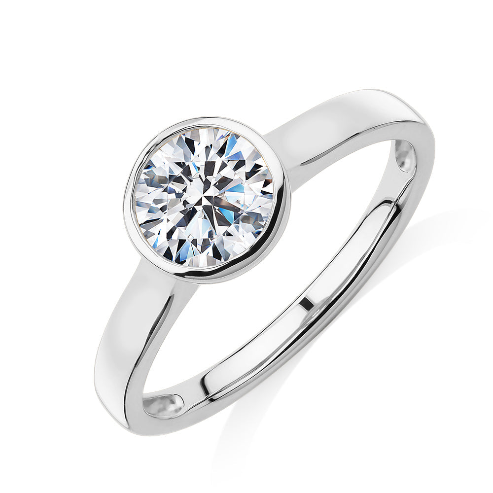 Round Brilliant solitaire engagement ring with 1 carat* diamond simulant in 14 carat white gold