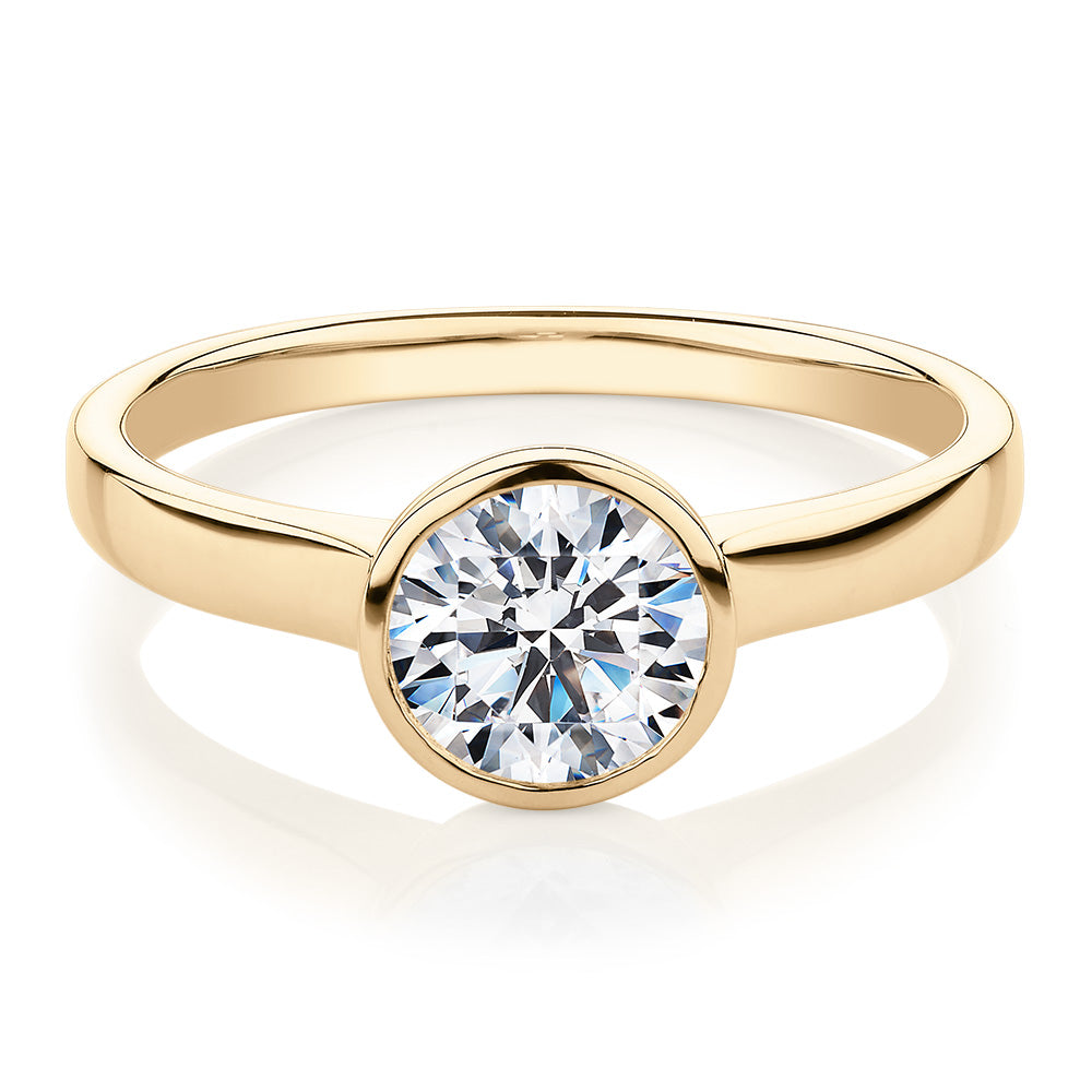 Round Brilliant solitaire engagement ring with 1 carat* diamond simulant in 14 carat yellow gold