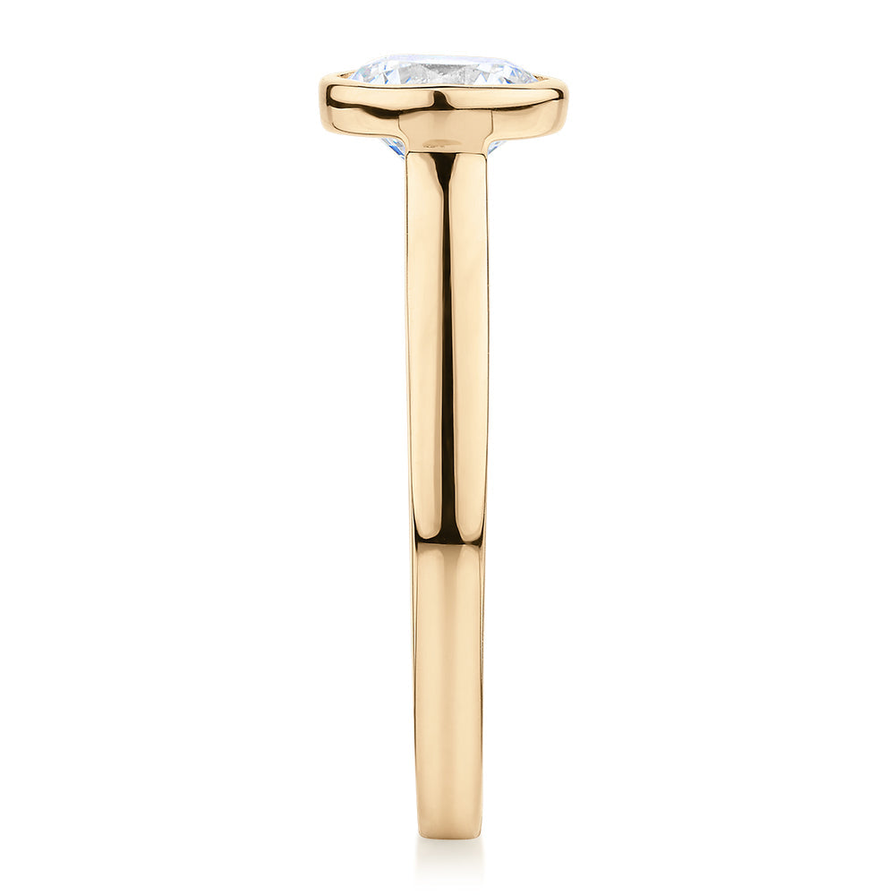 Round Brilliant solitaire engagement ring with 1 carat* diamond simulant in 14 carat yellow gold