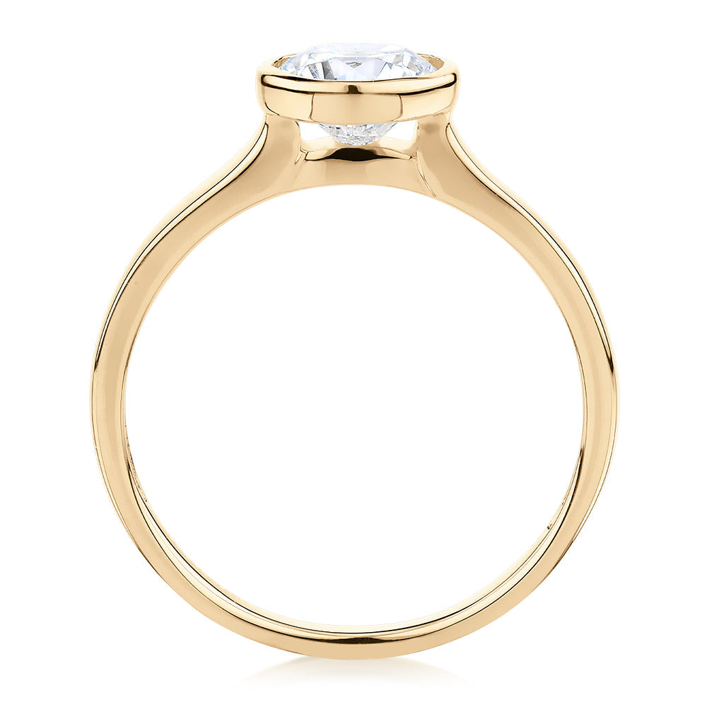 Round Brilliant solitaire engagement ring with 1 carat* diamond simulant in 14 carat yellow gold