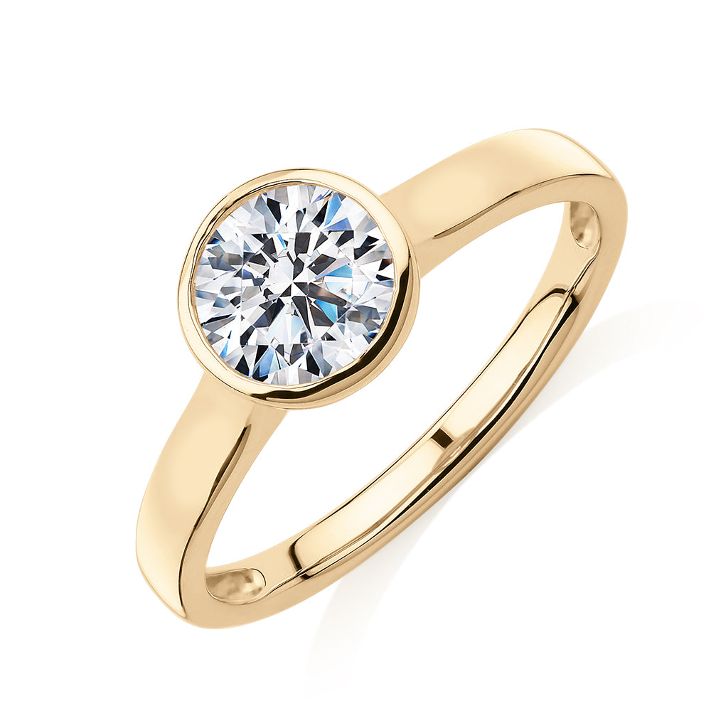 Round Brilliant solitaire engagement ring with 1 carat* diamond simulant in 14 carat yellow gold