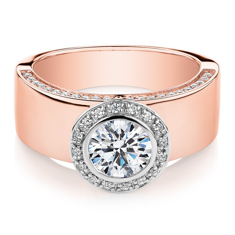 Round Brilliant halo engagement ring with 1.34 carats* of diamond simulants in 10 carat rose and white gold