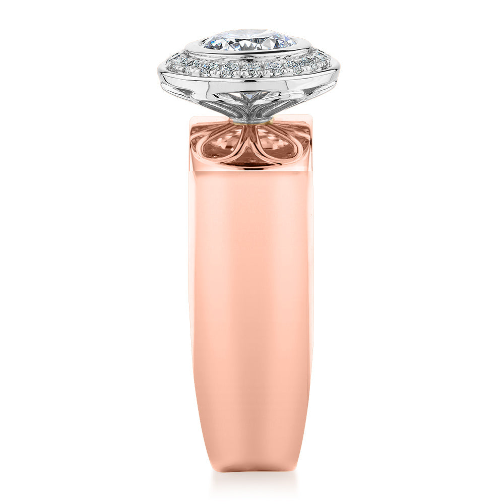 Round Brilliant halo engagement ring with 1.37 carats* of diamond simulants in 10 carat rose and white gold