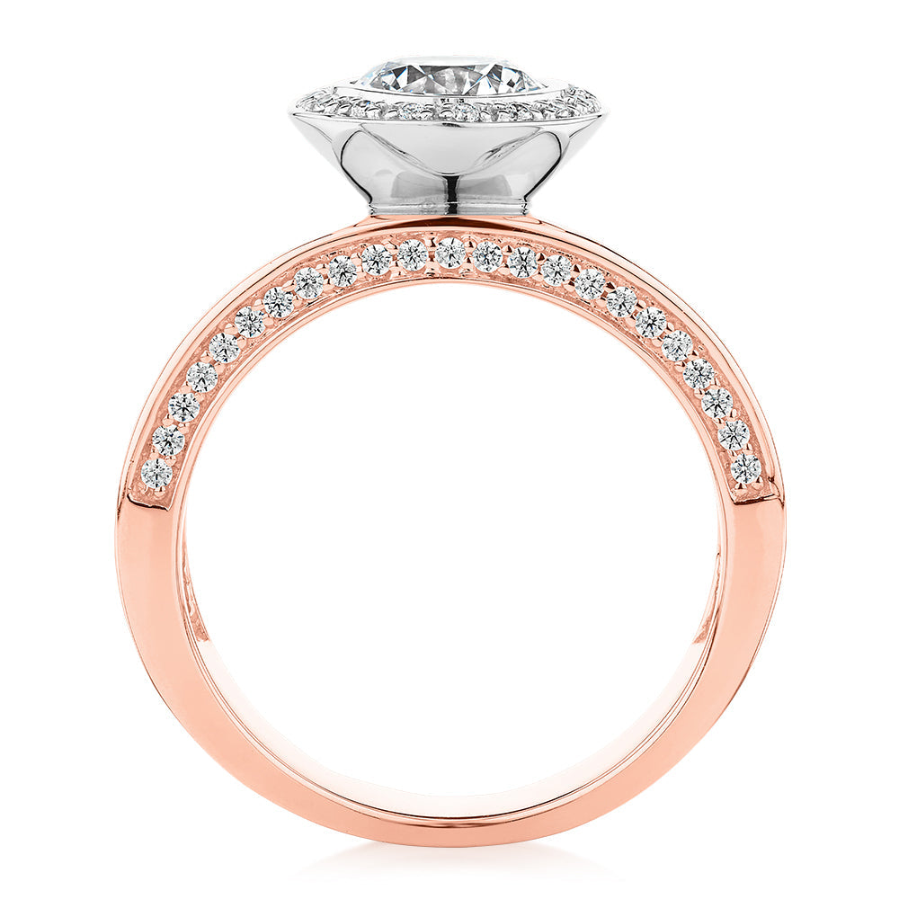 Round Brilliant halo engagement ring with 1.34 carats* of diamond simulants in 10 carat rose and white gold