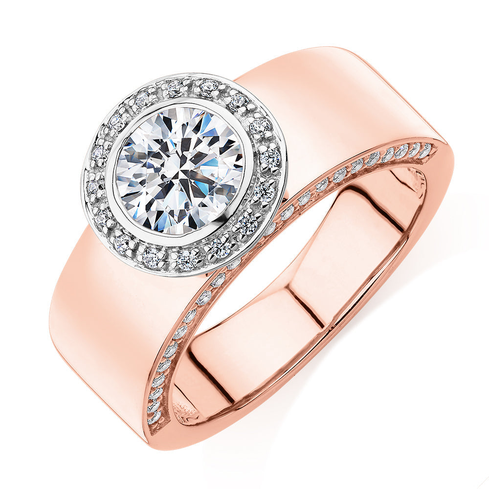 Round Brilliant halo engagement ring with 1.34 carats* of diamond simulants in 10 carat rose and white gold