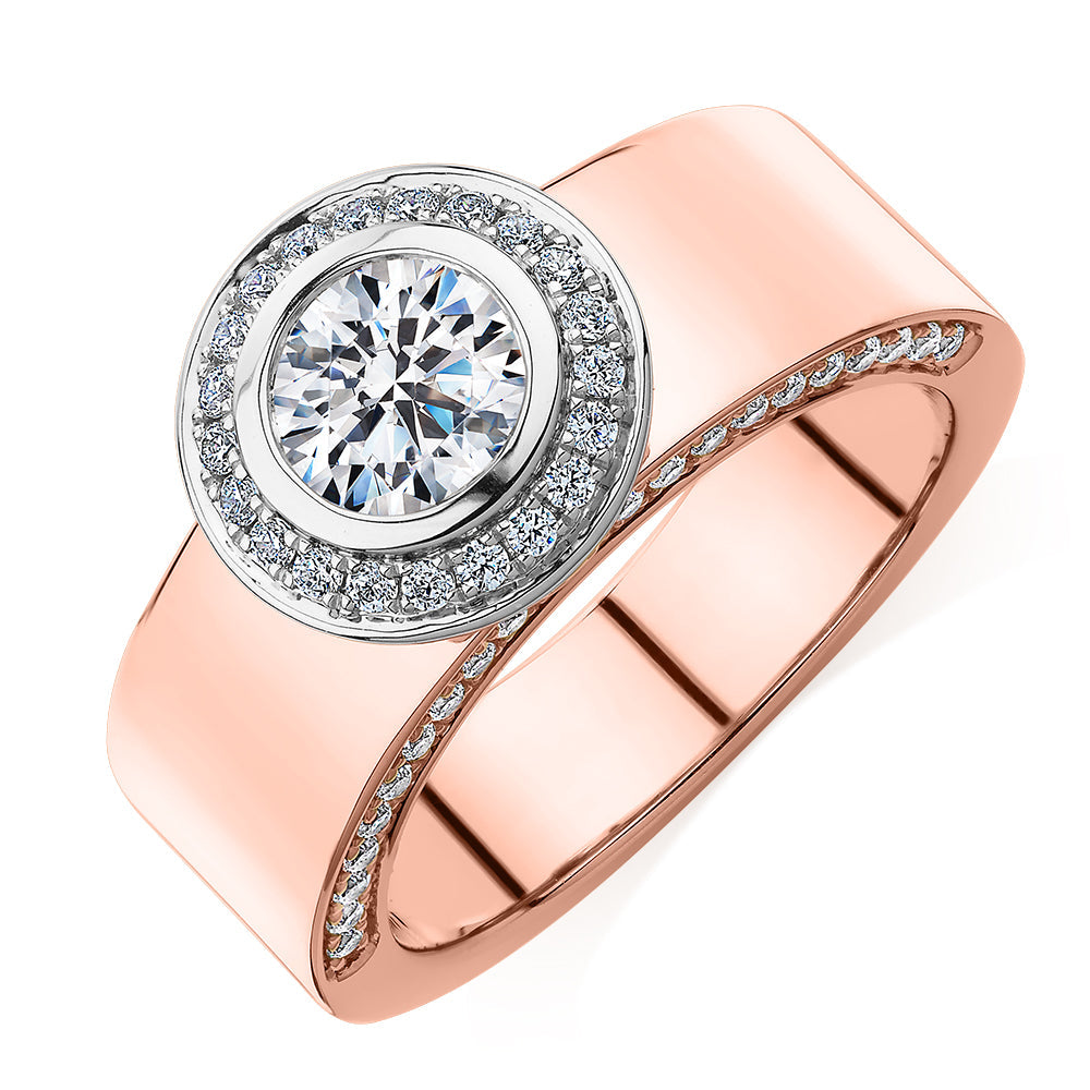 Round Brilliant halo engagement ring with 1.37 carats* of diamond simulants in 10 carat rose and white gold