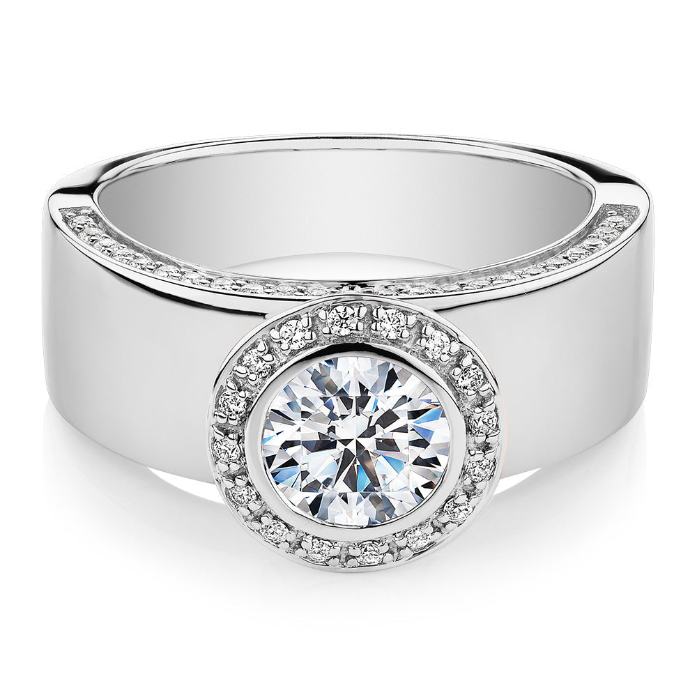 Round Brilliant halo engagement ring with 1.34 carats* of diamond simulants in 10 carat white gold
