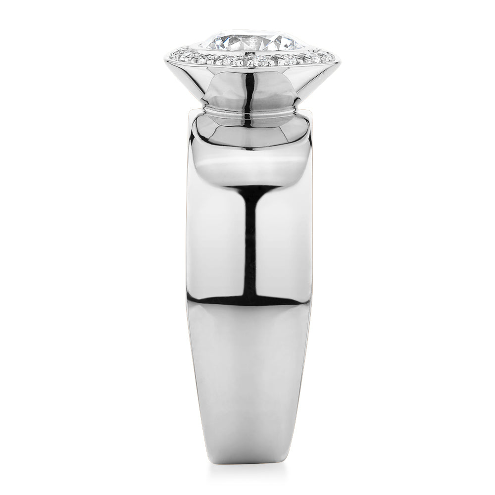 Round Brilliant halo engagement ring with 1.34 carats* of diamond simulants in 10 carat white gold