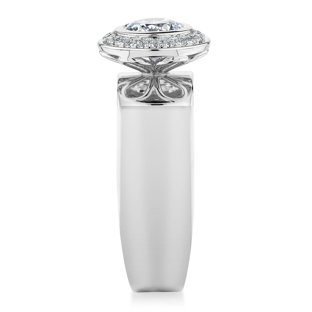 Round Brilliant halo engagement ring with 1.37 carats* of diamond simulants in 10 carat white gold
