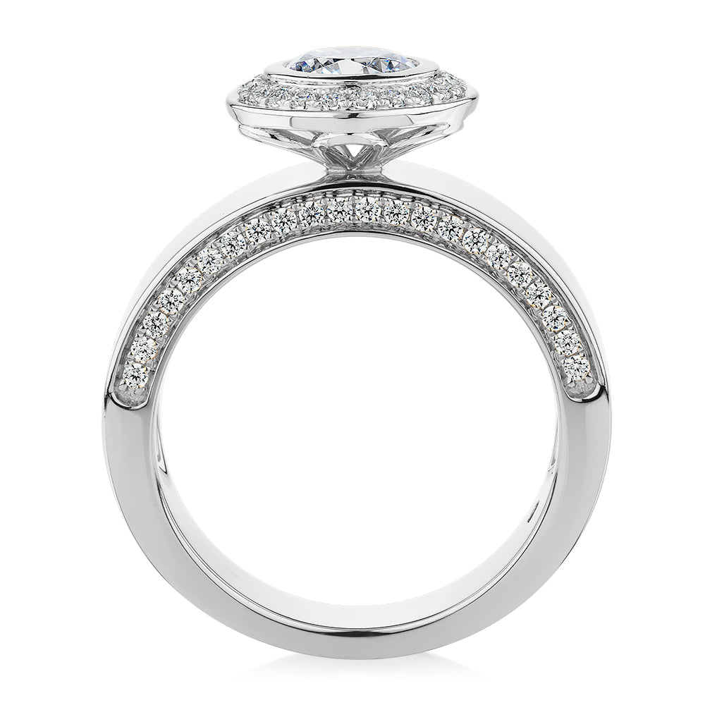 Round Brilliant halo engagement ring with 1.37 carats* of diamond simulants in 10 carat white gold