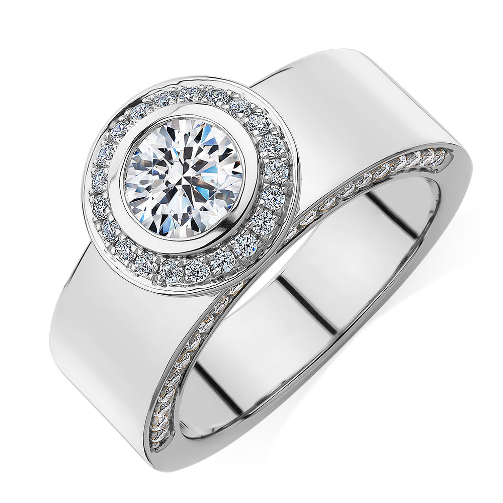 Round Brilliant halo engagement ring with 1.37 carats* of diamond simulants in 10 carat white gold