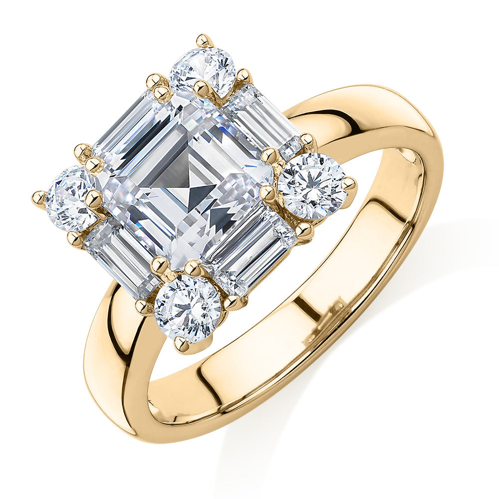 Princess Cut, Baguette and Round Brilliant halo engagement ring with 2.59 carats* of diamond simulants in 10 carat yellow gold